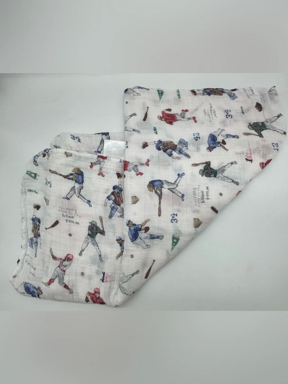 Little Unicorn Muslin Swaddle Blanket in Play Ball Print